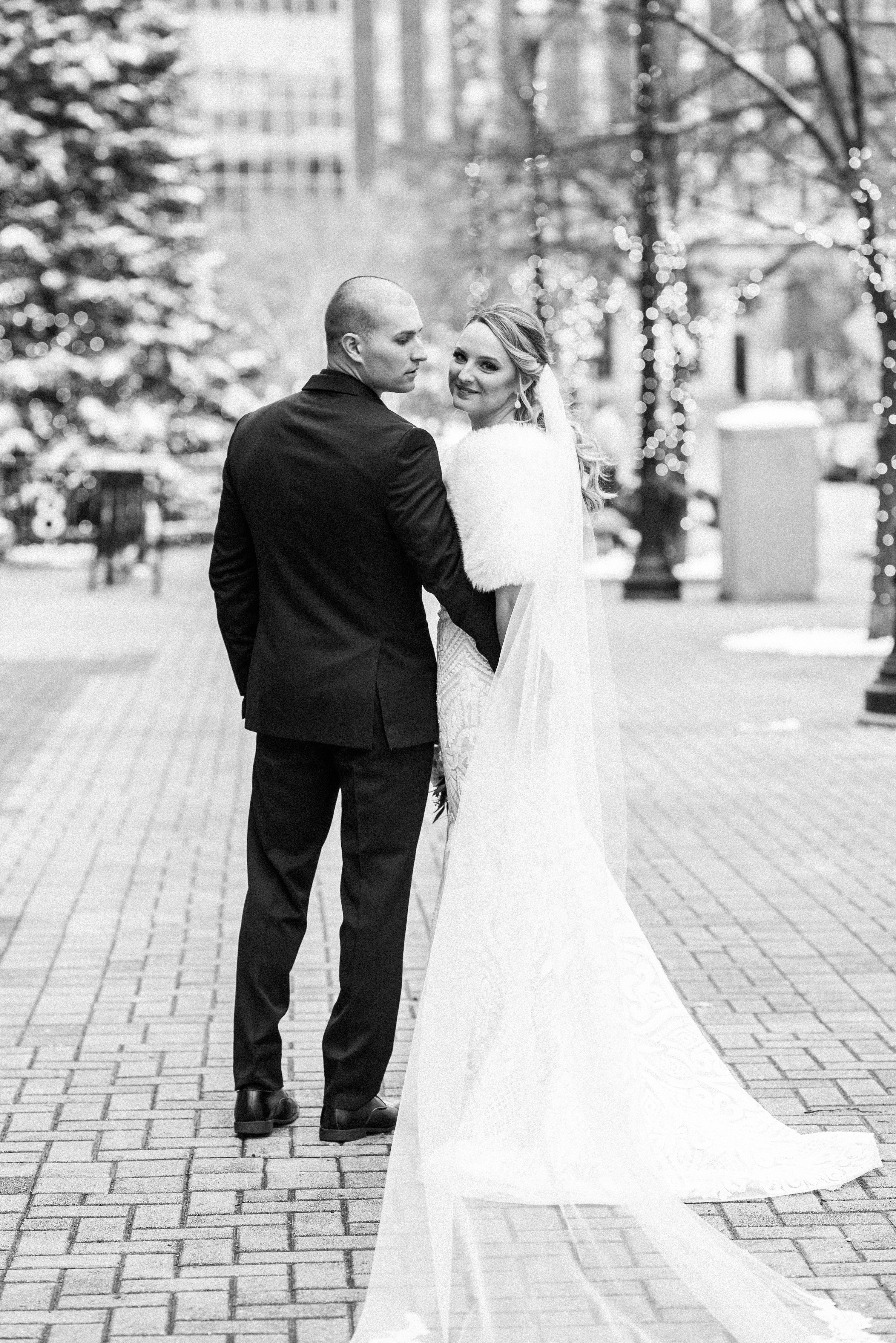 wedding day in downtown grand rapids, winter wedding photography, winter wedding, winter dowtown grand rapids michigan wedding, wedding day at cityflats hotel, cityflats hotel wedding day, winter wedding inspo, wedding inspiration