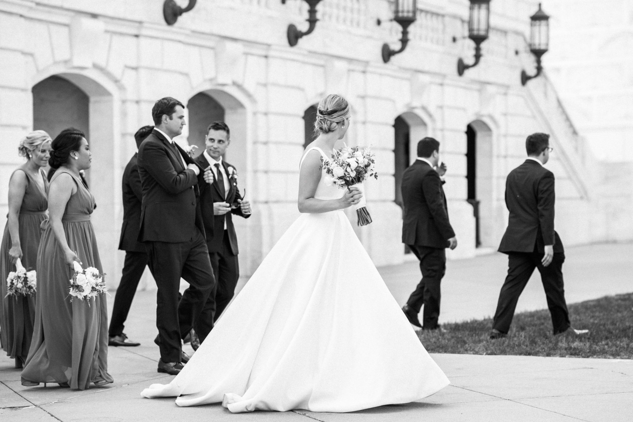 a bride walking in front of the detroit institute of arts
