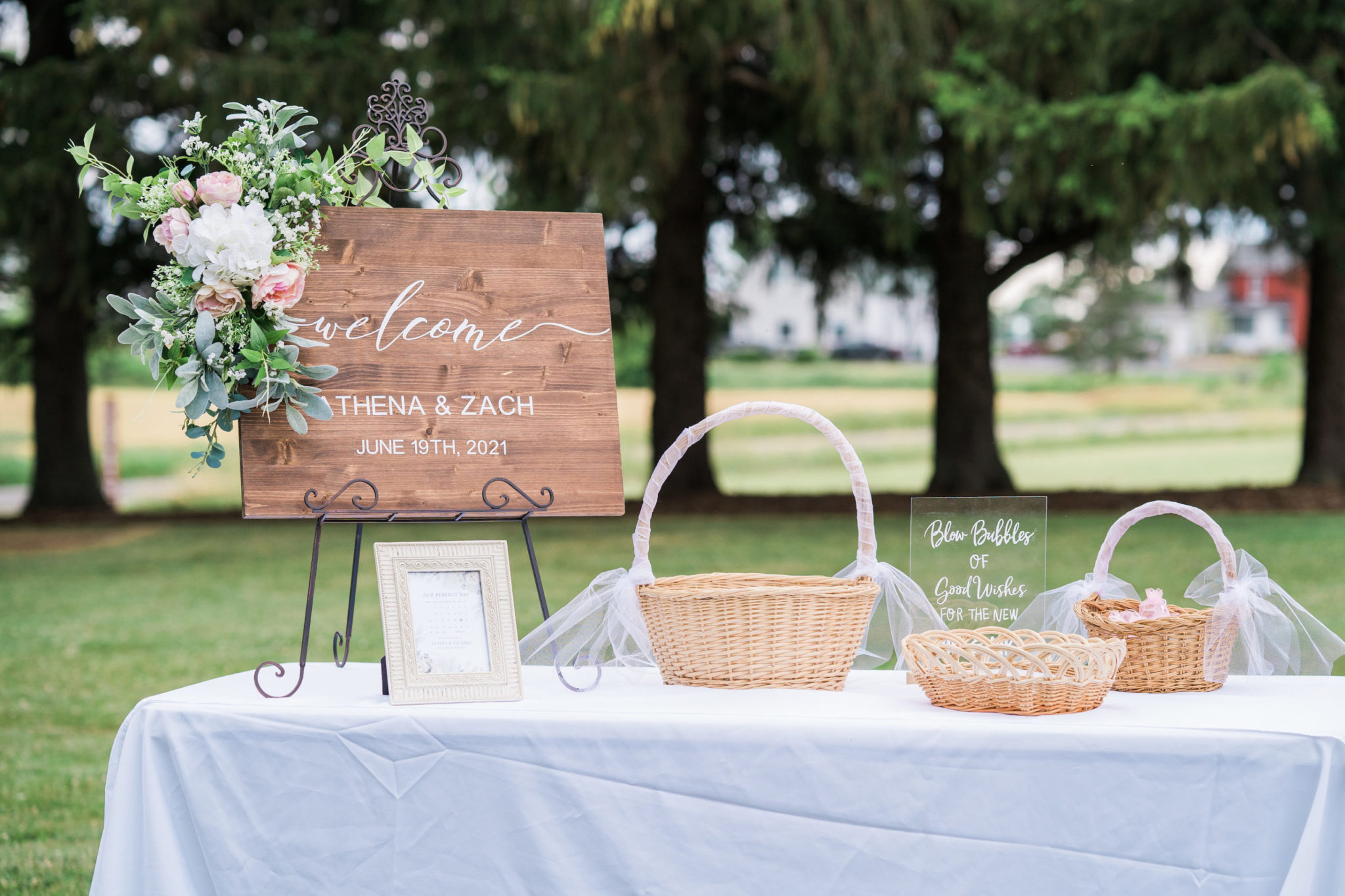 welcome sign at the summer wedding in williamston michigan